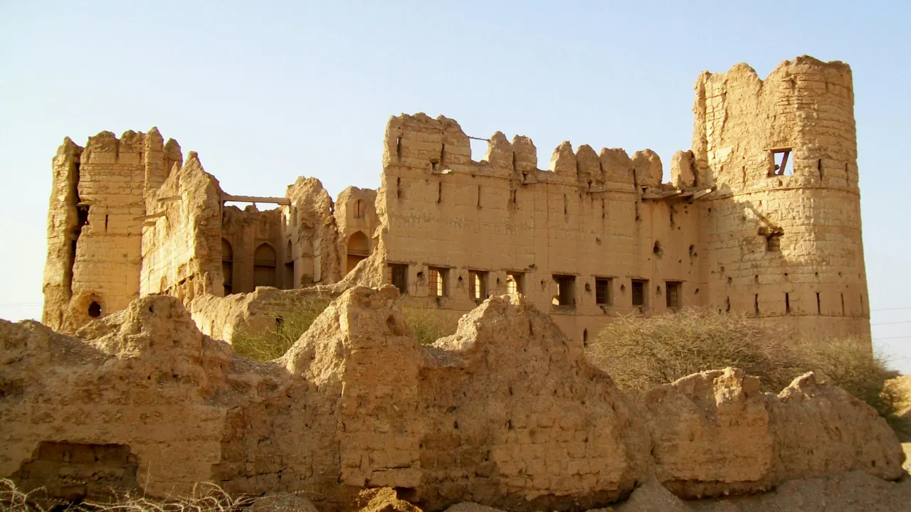 Historic earthen fort with towers and crenellated walls