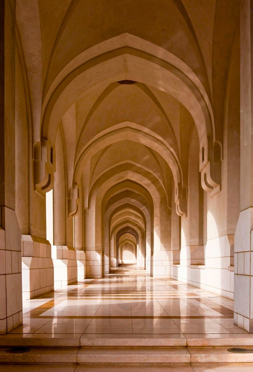 Ornate arched corridor at the Royal Opera House Muscat