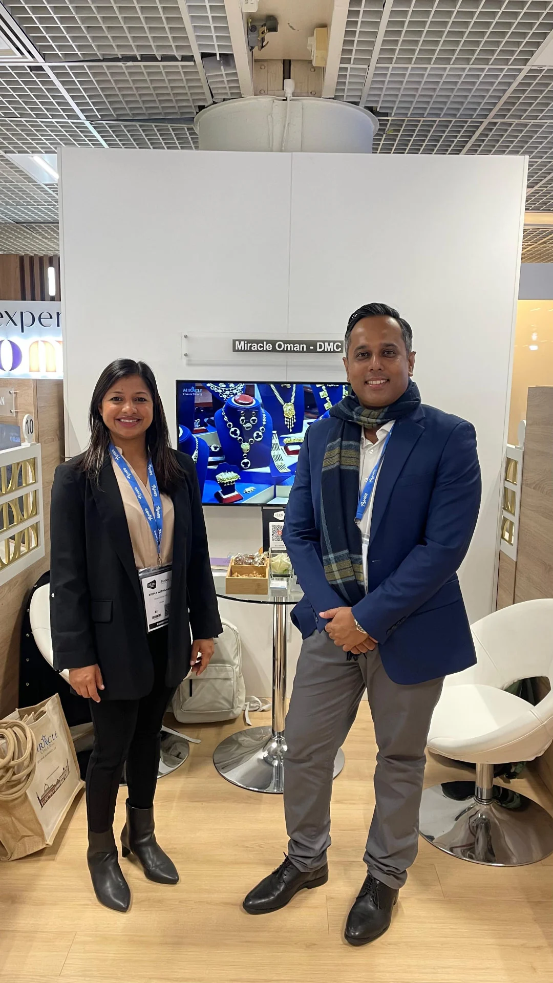 Two delegates together at a travel exhibition